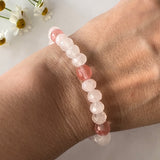 Armbånd med Rosenkvarts og rosa Agat, fasetterte steiner