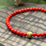 Jul: Armbånd Red Bamboo Coral med gullfarget kule