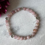 Armbånd med Pink Opal og sølvfarget blomster