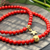 Jul: Armbånd Red Bamboo Coral med gullfarget stjerne charms