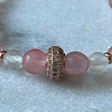 Turmalin med roséfarget rondell med Cubic Zirkon og noen små rondeller