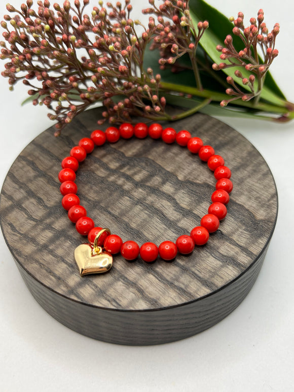 Armbånd Red Bamboo Coral med gullfarget hjerte charms